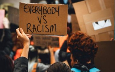 EVERYBODY VS. RACISM is a sentiment and does not function as a trademark